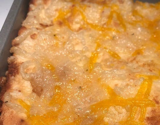 Daiya Cutting Board Shreds: Cheddar and Pepperjack melted on bread